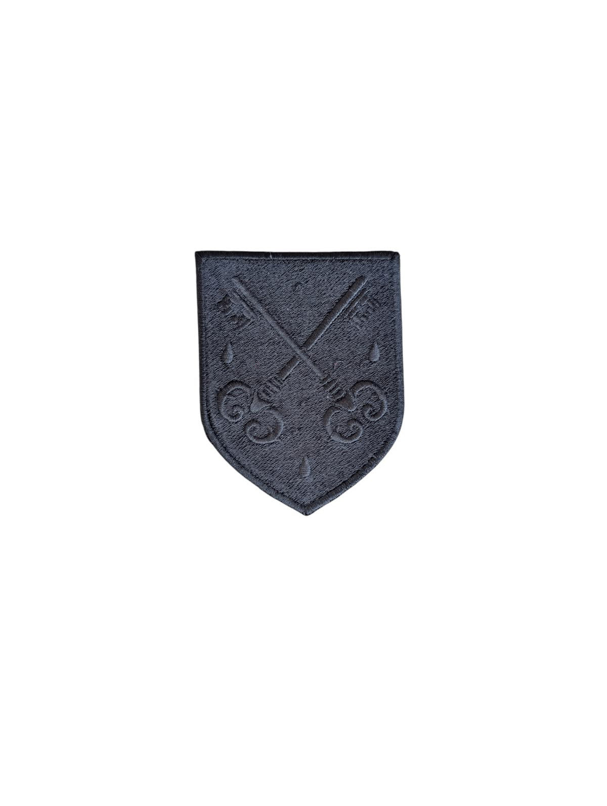 Black embroidered FSSP badge featuring the crossed keys and three-drop emblem on a plain white background