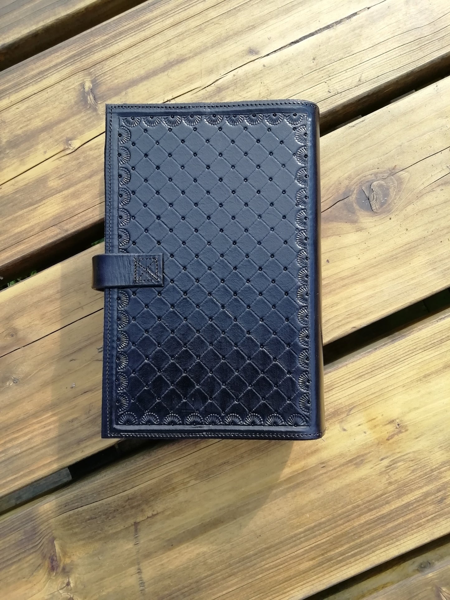 Embossed leather cover
