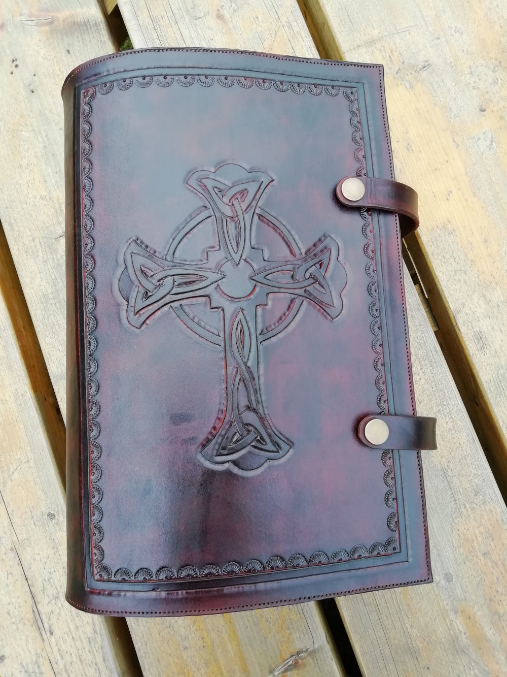 Embossed leather cover