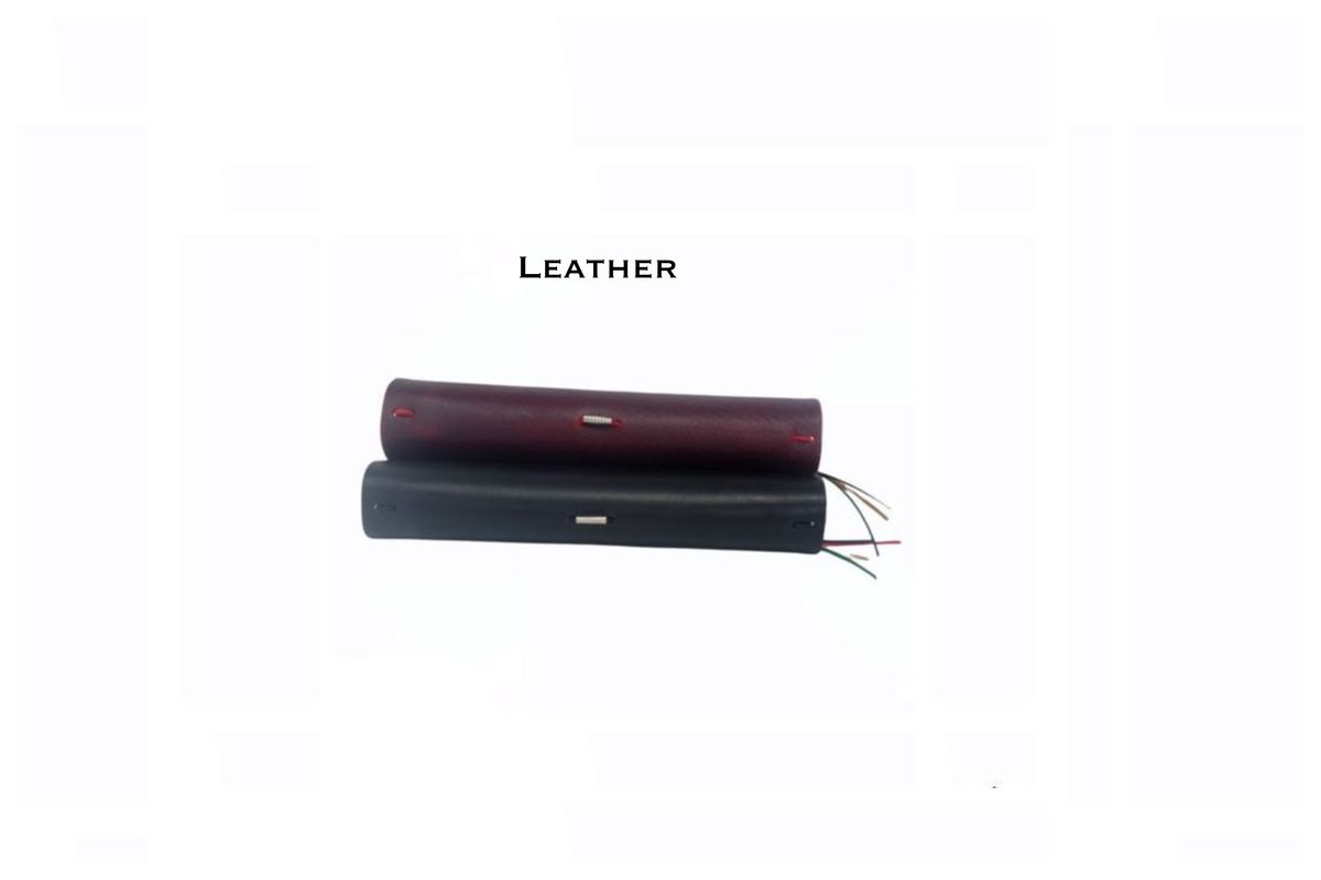 Black and red full-grain leather Magnificat and Benedictus covers shown from the spine