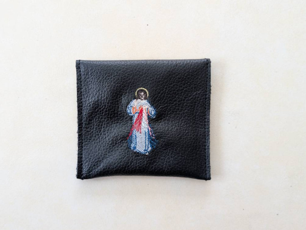 Divine Mercy leather rosary pouch photographed square-on against a white background